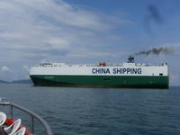 A cargo ship passes through Lake Gatun, Panama
